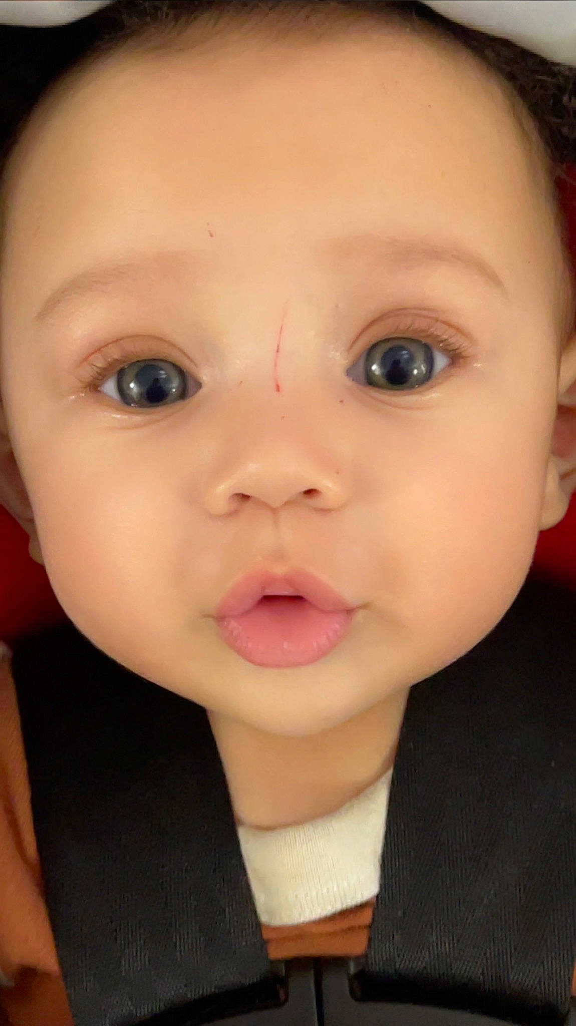 Dax is registered to the contest to win money with this photo: baby, baby_toddler_clothing, cheek, child, chin, close_up, ear, eyebrow, eyelash, forehead, iris, jaw, lip, mouth, no_expression, nose, person, portrait, portrait_photography, skin