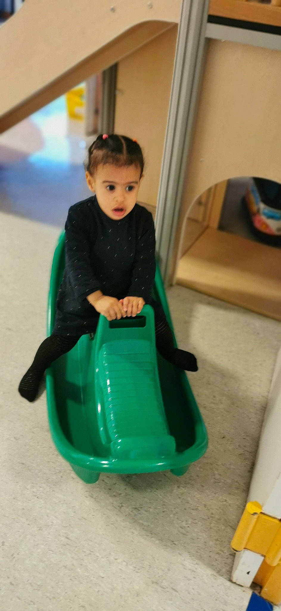 Naya participe au concours pour gagner de l'argent avec cette photo : baby_products, baby_toddler_clothing, baby_toys, chute, curtain, electric_blue, flooring, fun, hardwood, leisure, person, picture_frame, plastic, play, recreation, riding_toy, room, sitting, sleeve, surprise