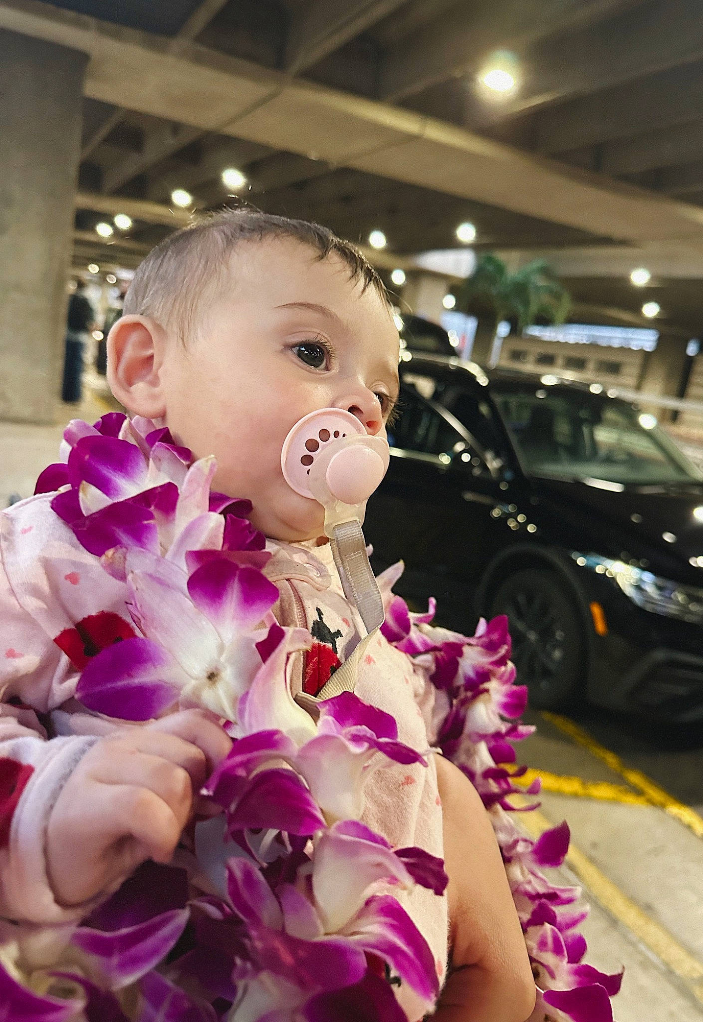 Evelyn is registered to the contest to win money with this photo: automotive_design, automotive_lighting, bouquet, car, cut_flowers, dress, event, flower_arranging, happy, magenta, motor_vehicle, person, personal_luxury_car, petal, pink, plant, purple, tire, toddler, toy