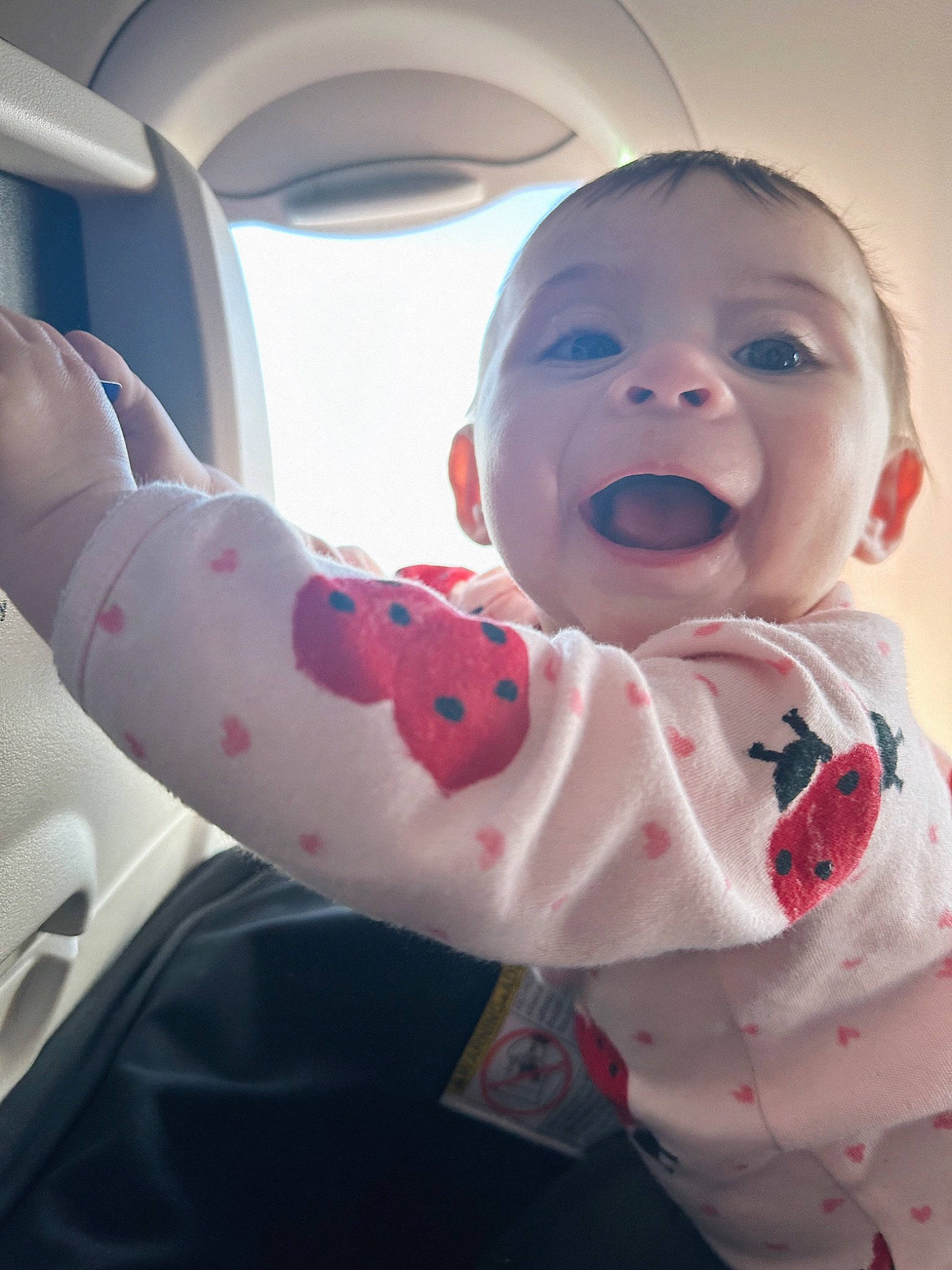 Evelyn is registered to the contest to win money with this photo: baby, baby_products, baby_toddler_clothing, carmine, cheek, child, comfort, eye, fun, gesture, happy, linens, lip, mouth, nose, person, pink, skin, sleeve, smile