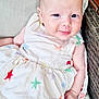 baby, child, dress, stars, smile, cushion, chair, infant, skin, face, hand, comfort, cute, happy, sitting, outdoor, fabric, pattern, young, portrait
