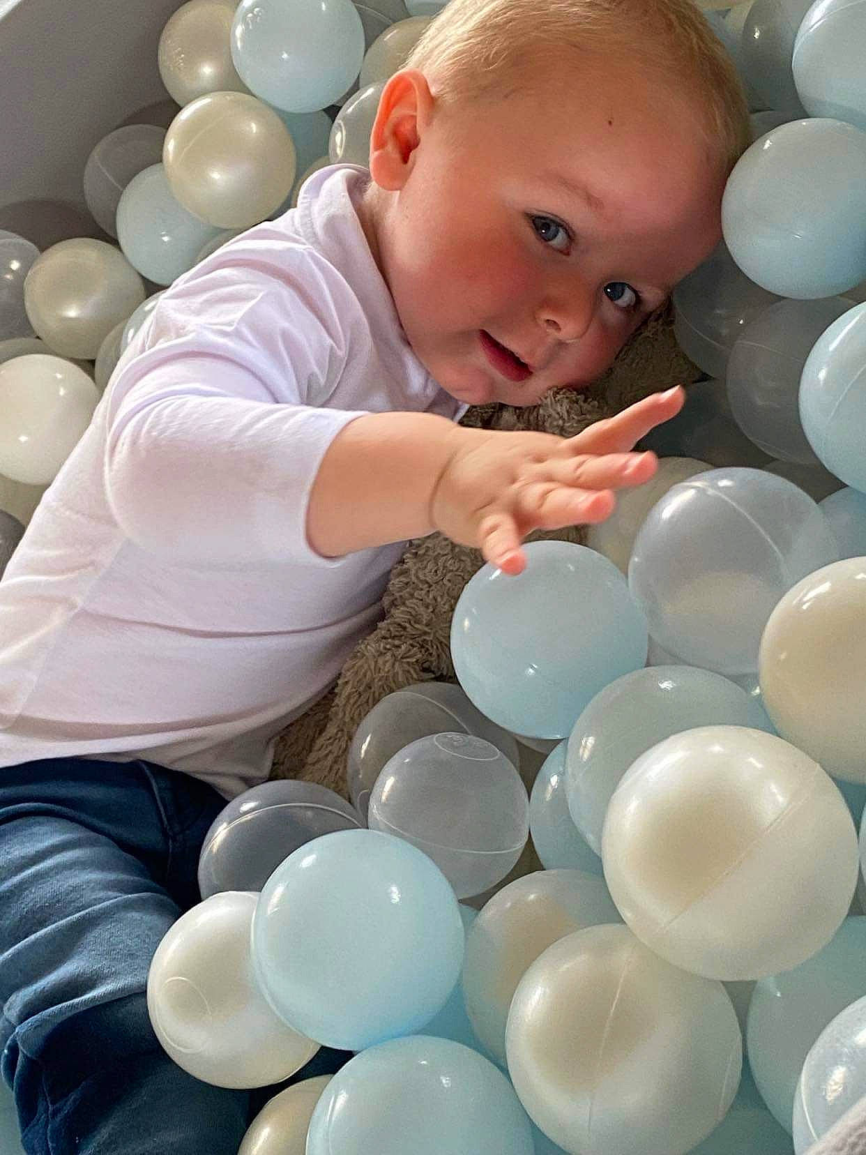 Georgie is registered to the contest to win money with this photo: baby, baby_toddler_clothing, balloon, beauty, blue, child, fun, happy, head, light, organ, party_supply, people, person, photograph, product, snapshot, toddler, toy, white
