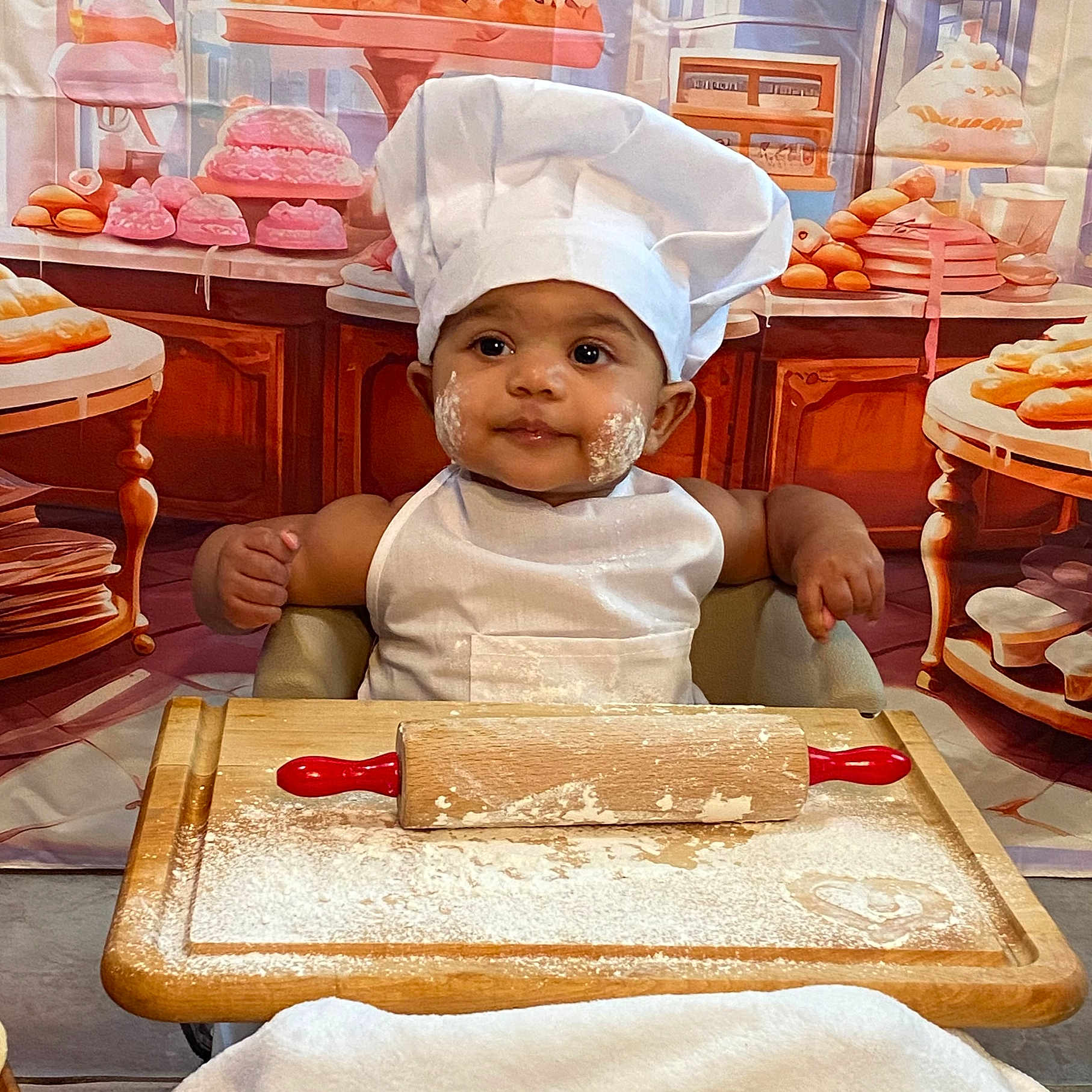 Lola joined the competition — help win amazing prizes! baby, blade, bread, cheese, chef, choppingboard, cream, dessert, eating, face, food, furniture, head, icecream, knife, pancake, people, person, table, tabletop