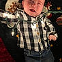 Daniel is registered to the contest to win money with this photo: baby, bodypart, clothing, coat, cushion, face, finger, furniture, hand, hat, head, homedecor, jacket, jeans, newborn, pants, person, photography, portrait, shirt