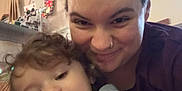 Lucas joined the competition — help win amazing prizes! adult, casual_clothing, child, closeup, colorful_hair, curly_hair, curtain, face, family, furniture, happy, holding, home, indoor, nose_ring, portrait, selfie, smiling, toddler, toy
