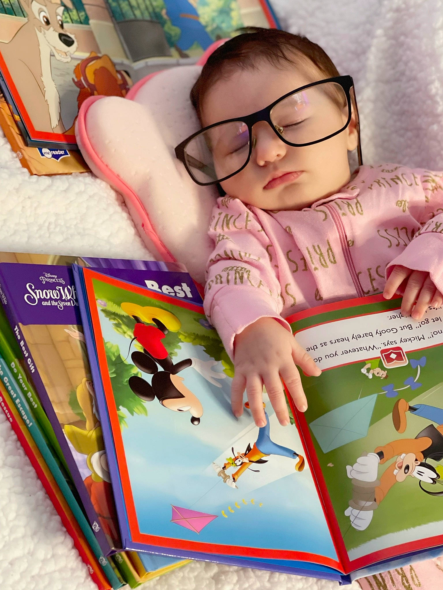 Ashley is registered to the contest to win money with this photo: art, book, book_cover, child, eyewear, fiction, fun, games, glasses, happy, illustration, leisure, person, play, product, publication, reading, recreation, room, toddler