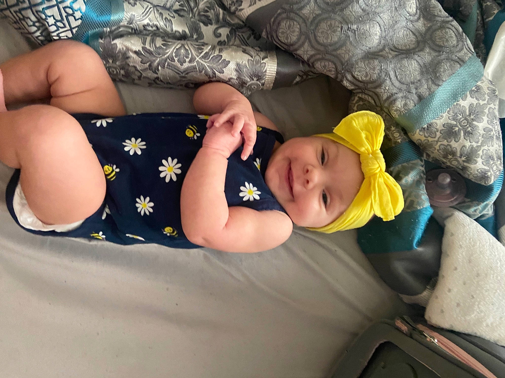 Meelah is registered to the contest to win money with this photo: baby, baby_products, baby_sleeping, baby_toddler_clothing, bedding, bedtime, child, comfort, couch, fashion_accessory, hat, headwear, human_leg, joy, linens, nap, pattern, person, sitting, sleep