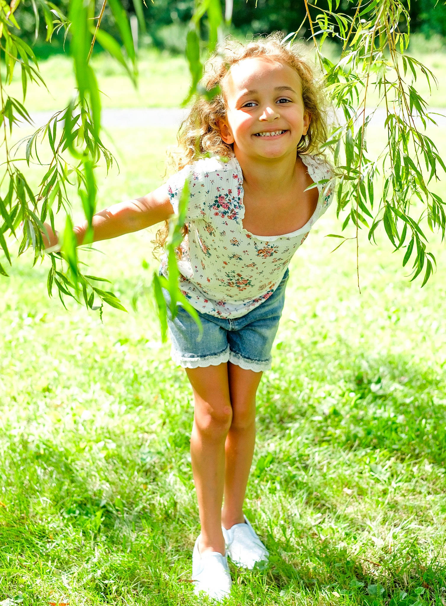 Olivia joined the competition — help win amazing prizes! day_dress, eye, face, forest, fun, grass, grass_family, grassland, happy, joy, leisure, pattern, people_in_nature, person, plant, recreation, shrub, smile, sunlight, t_shirt