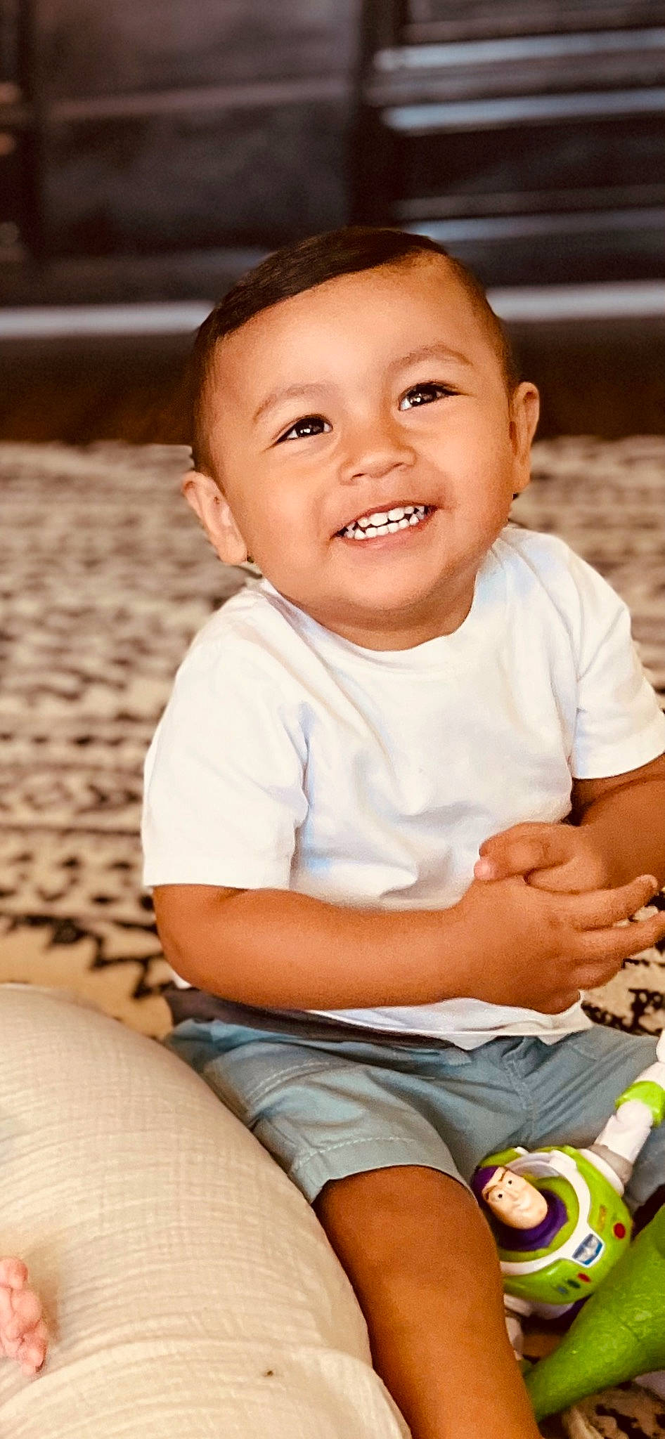 Jeremiah is registered to the contest to win money with this photo: baby, baby_toddler_clothing, cheek, child, finger, flash_photography, fun, grass, happy, joy, leisure, mouth, nose, person, sitting, skin, smile, summer, thigh, toddler