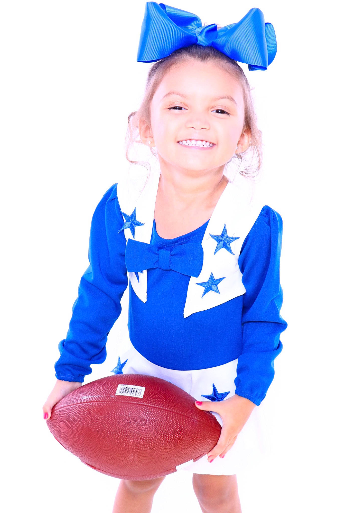 Kinsley Reyes is registered to the contest to win money with this photo: blue, child, clothing, costume, electric_blue, headgear, joy, outerwear, person, personal_protective_equipment, play, product, sleeve, smile, sports_uniform, toddler, uniform