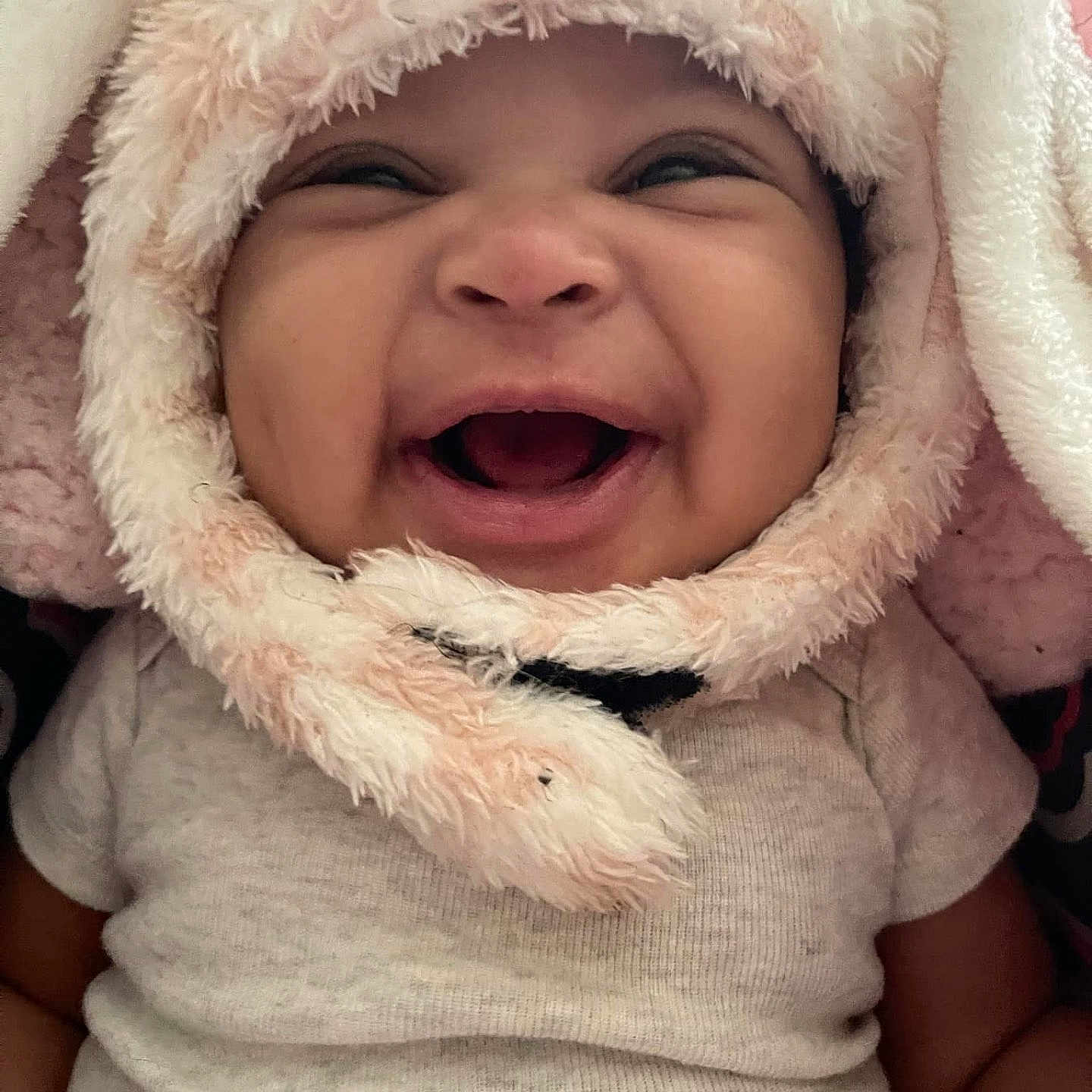 Perfect Hodges is registered to the contest to win money with this photo: baby, babylaughing, bonnet, clothing, coat, face, happy, hat, head, hood, jacket, laughing, person, photography, portrait, smile