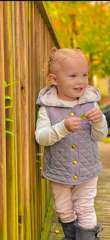 Kenzlee joined the competition — help win amazing prizes! baby, baby_products, blond, child, child_model, joy, outerwear, person, photography, play, product, skin, sleeve, smile, standing, toddler, yellow