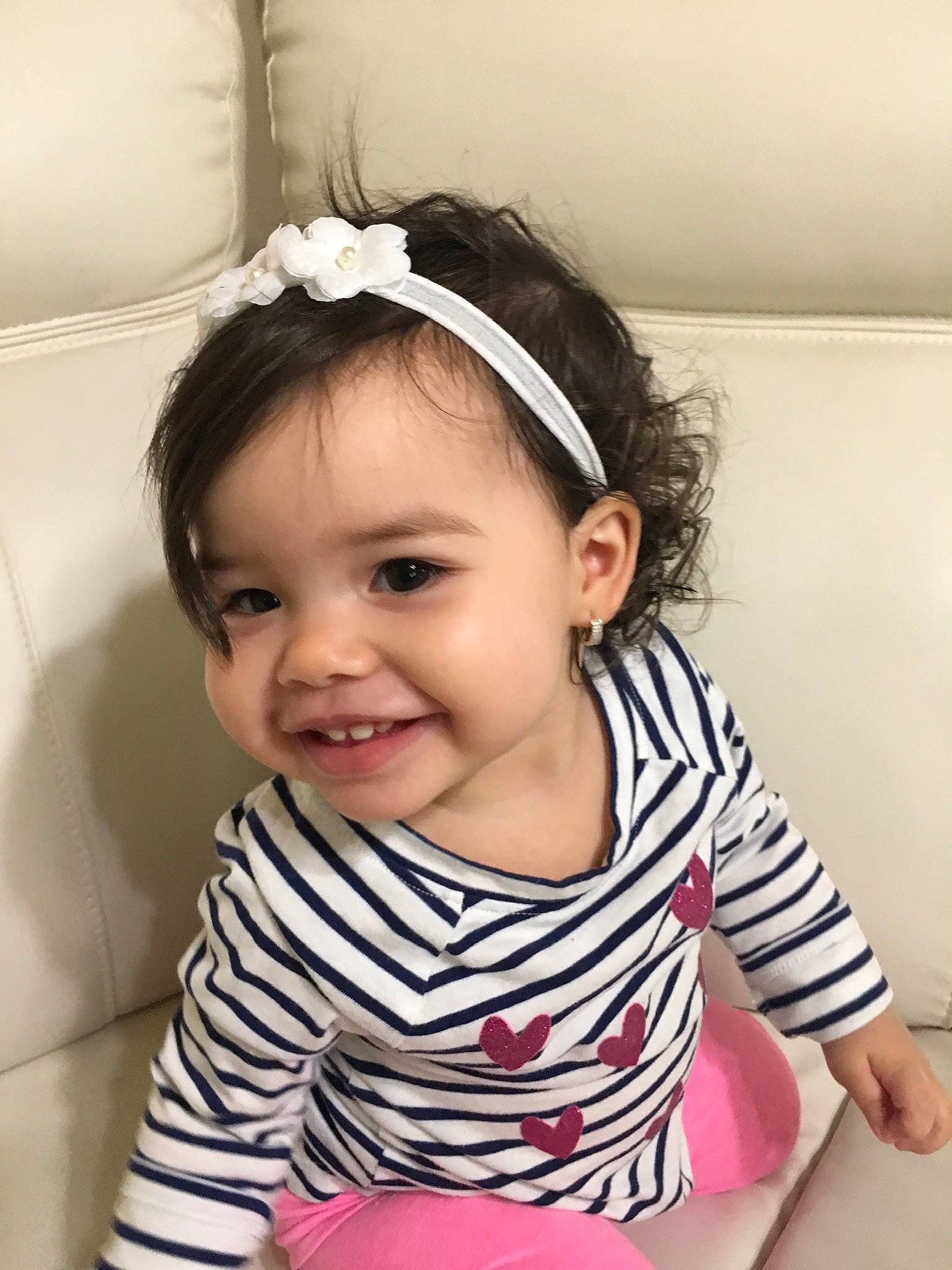 Maggie Fonseca is registered to the contest to win money with this photo: baby, baby_toddler_clothing, beauty, black_hair, cheek, child, child_model, ear, face, fashion_accessory, hair, hair_accessory, happy, head, headband, headgear, joy, person, pink, skin