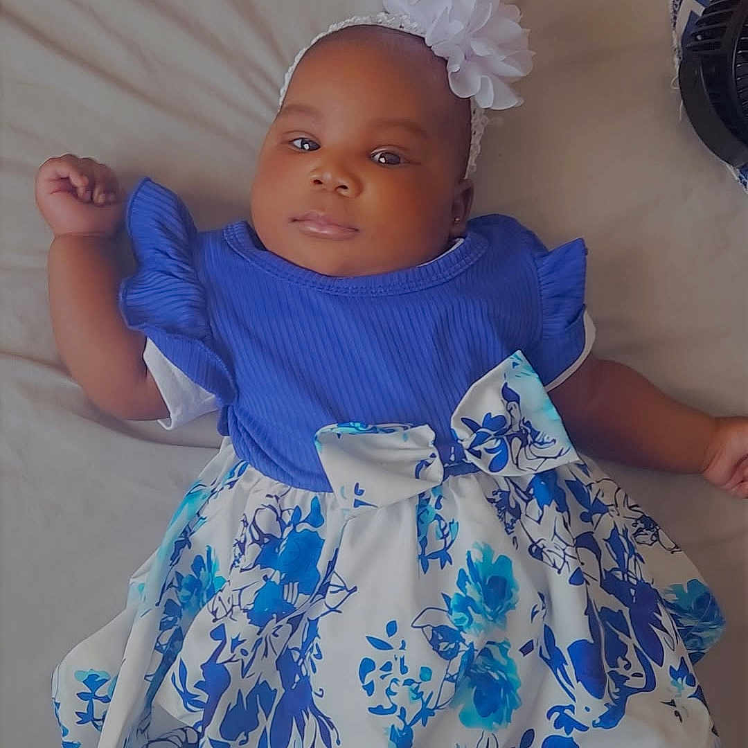 P'Ajah is registered to the contest to win money with this photo: baby, bed, clothing, cushion, dress, face, food, furniture, happy, hat, head, homedecor, meat, person, photography, pork, portrait, sitting, smile, toy