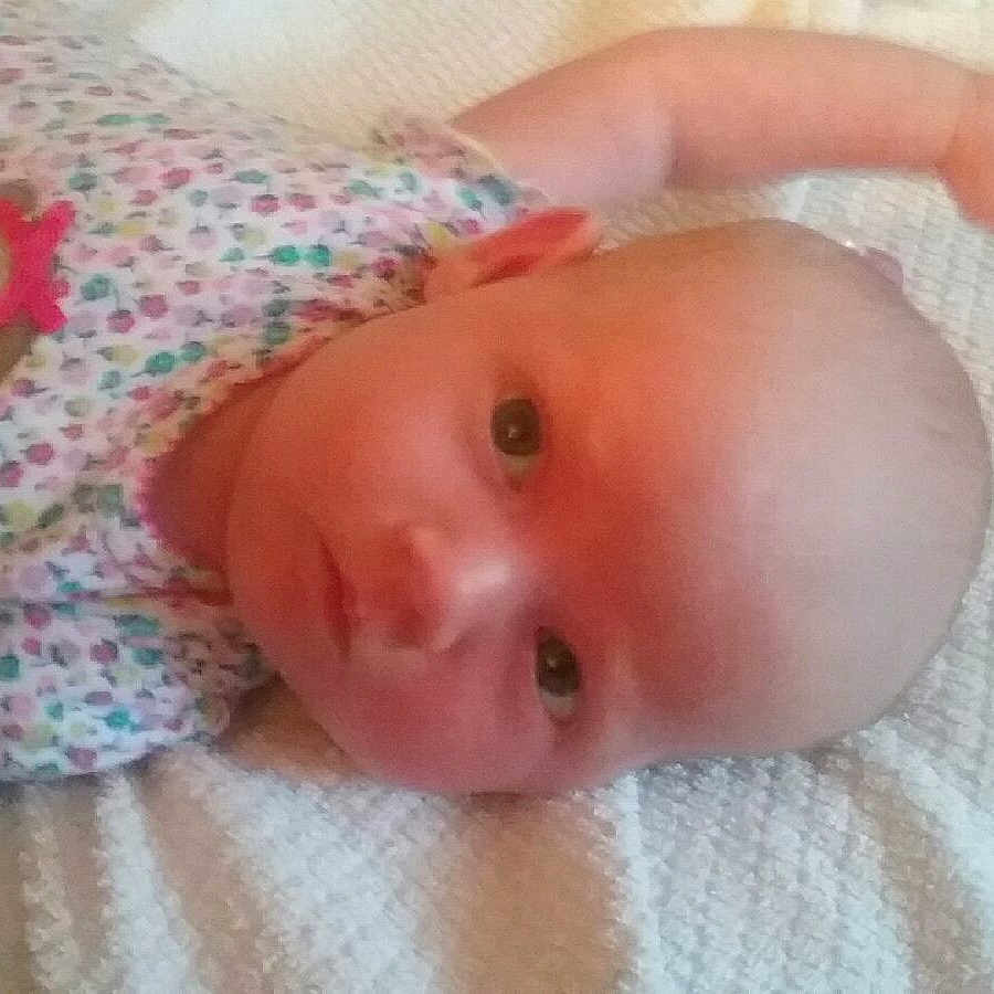 Tara is registered to the contest to win money with this photo: child, hand, infant, nose, person, pink, product, skin, toddler