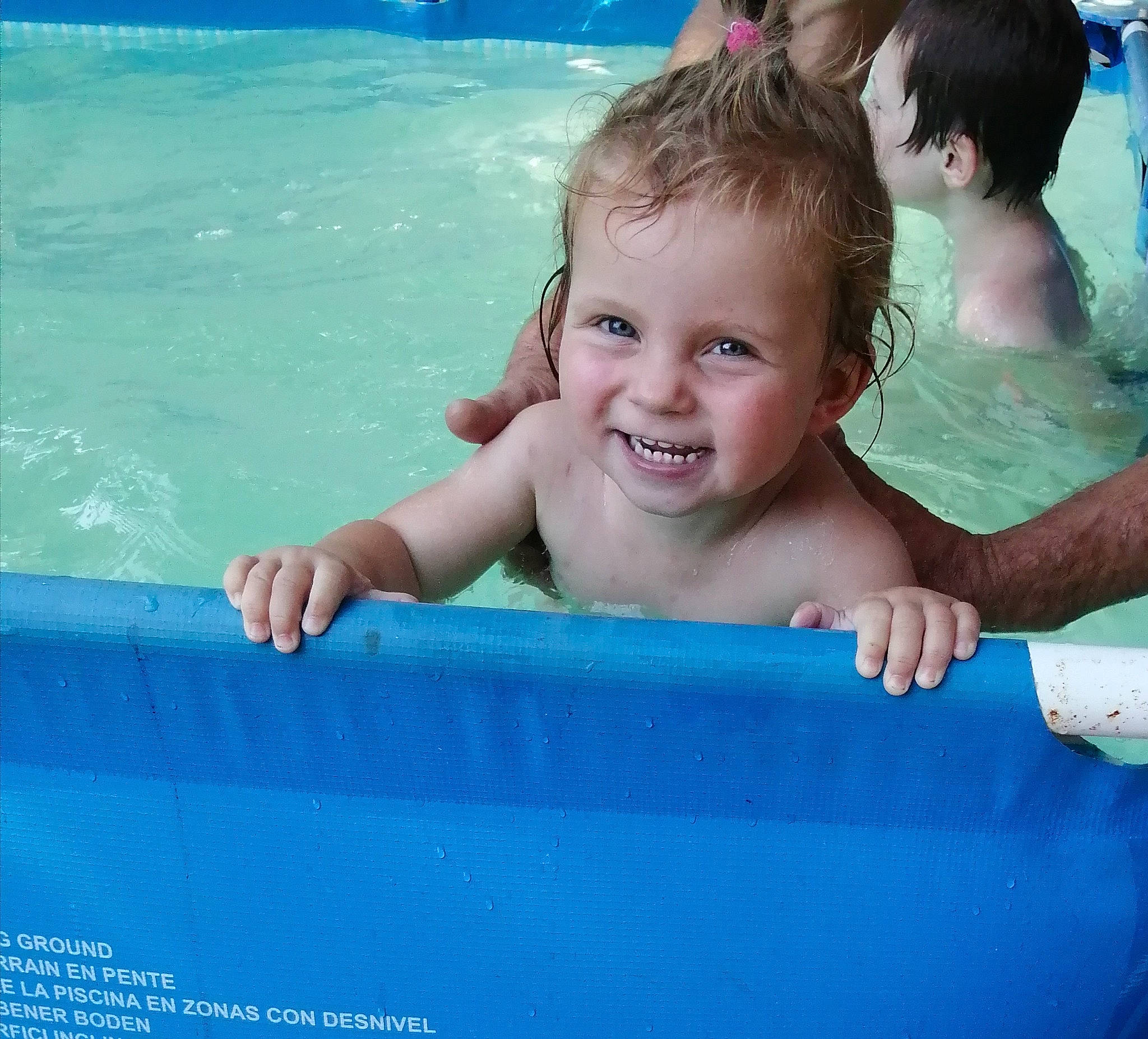 Joy participe au concours pour gagner de l'argent avec cette photo : aqua, automotive_exterior, azure, bathing, blue, child, electric_blue, fun, happy, joy, leisure, person, photograph, product, recreation, smile, snapshot, summer, swimming_pool, toddler