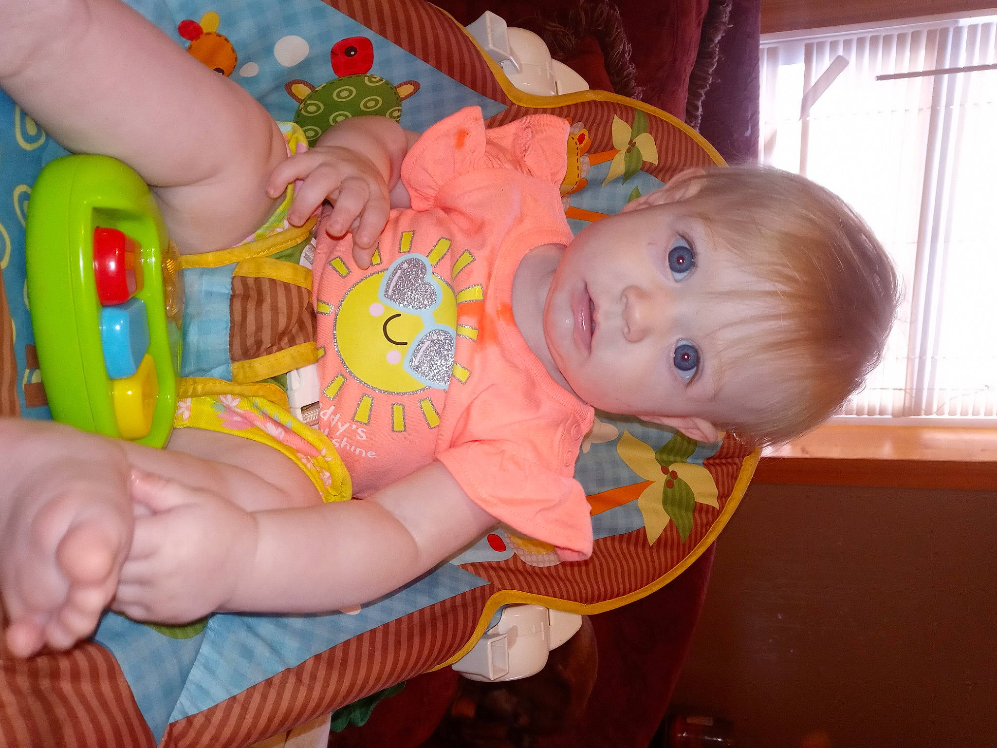 Saffire is registered to the contest to win money with this photo: baby, baby_bottle, baby_products, baby_toddler_clothing, cheek, child, drinkware, finger, fun, hand, human_body, iris, leg, mouth, person, plastic_bottle, room, skin, toddler, toy