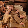 Enzo joined the competition — help win amazing prizes! baby, child, puppy, dog, knitted_outfit, cap, chair, plush, teddy_bear, vintage, furniture, carpet, indoor, portrait, cute, cozy, pet, fur, resting, thoughtful