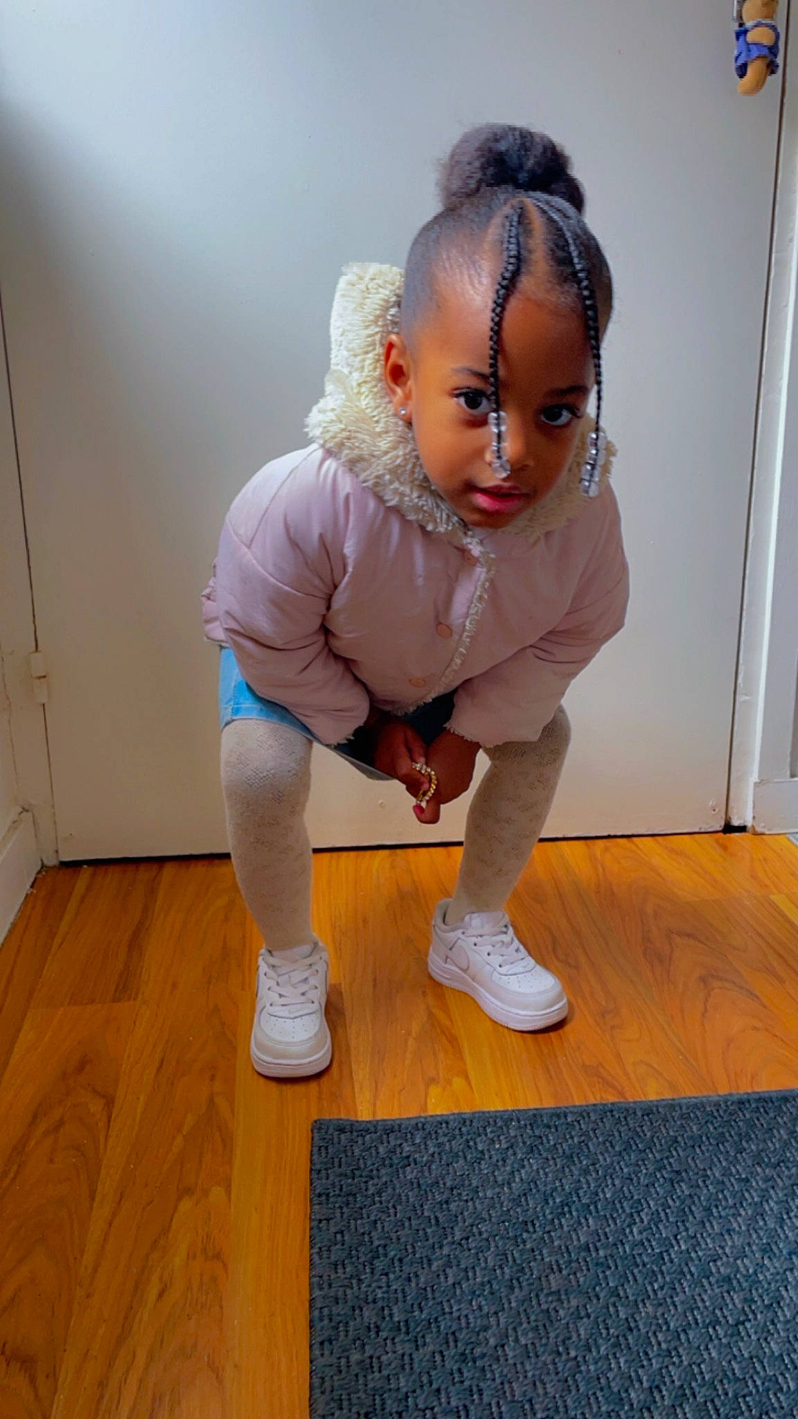 Lunna participe au concours pour gagner de l'argent avec cette photo : arm, baby, baby_toddler_clothing, doll, eye, floor, flooring, foot, fun, hairstyle, hardwood, human_leg, knee, laminate_flooring, person, sleeve, thigh, toddler, wood, wood_flooring