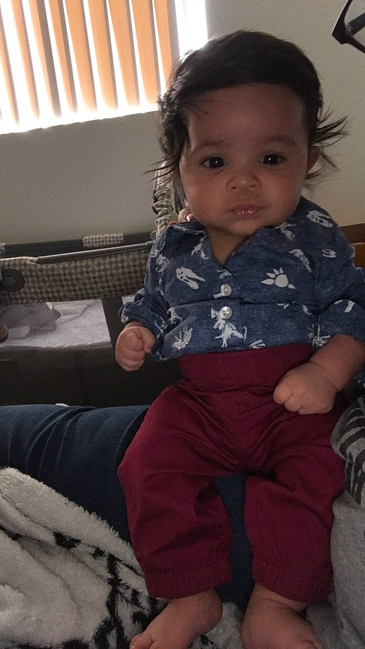 Tristian is registered to the contest to win money with this photo: arm, boy, child, cool, day, eye, girl, infant, leg, person, product, sitting, skin, smile, standing, toddler