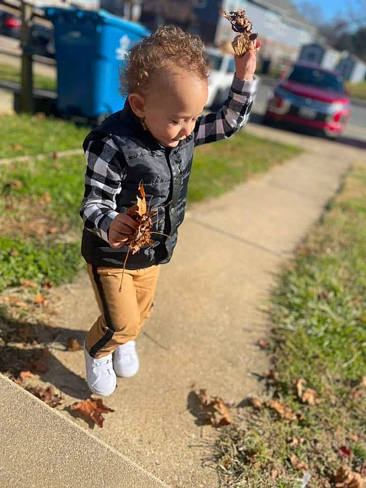 Xzavier is registered to the contest to win money with this photo: asphalt, car, child, fun, grass, happy, leisure, pattern, person, plant, recreation, road, running, sidewalk, sleeve, sneakers, soil, t_shirt, toddler, tree