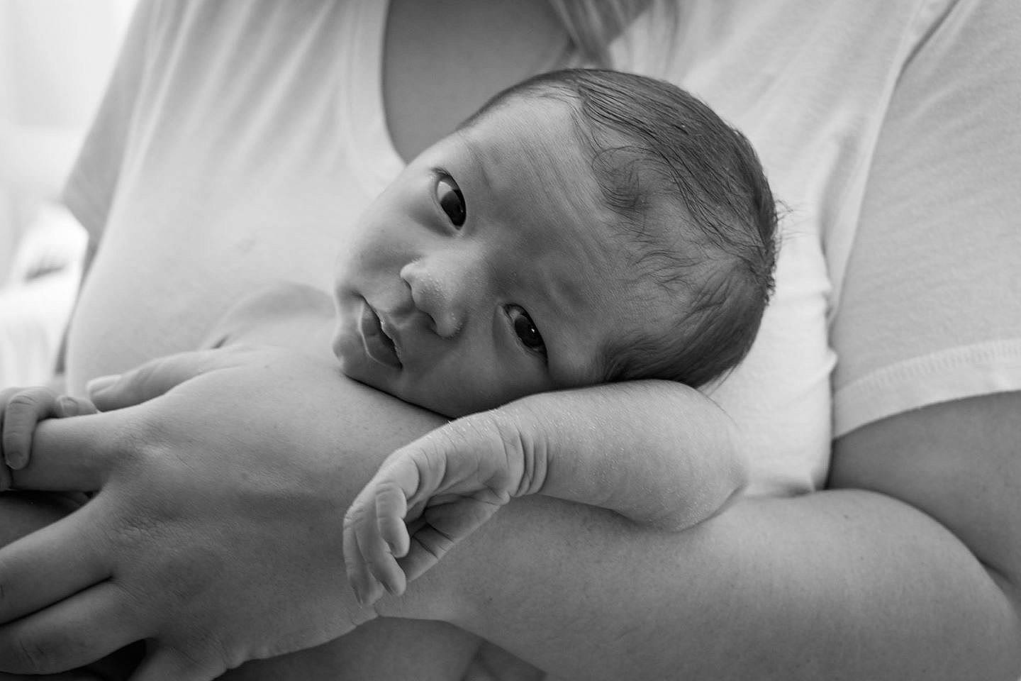 Reese is registered to the contest to win money with this photo: arm, baby, birth, black_and_white, child, childbirth, eye, finger, hand, monochrome, monochrome_photography, person, photograph, photography, portrait_photography, skin, style, toddler