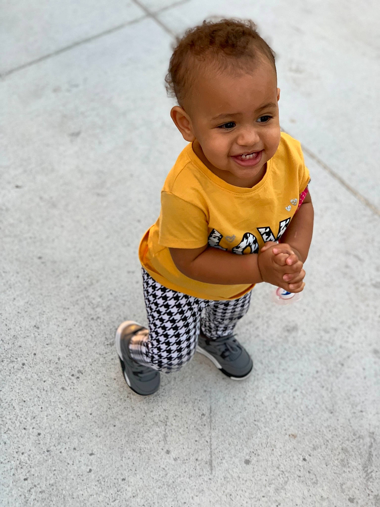 Cali joined the competition — help win amazing prizes! baby, child, floor, flooring, footwear, head, joy, pattern, people, person, photography, play, shoe, sitting, skin, smile, standing, t_shirt, toddler, vacation