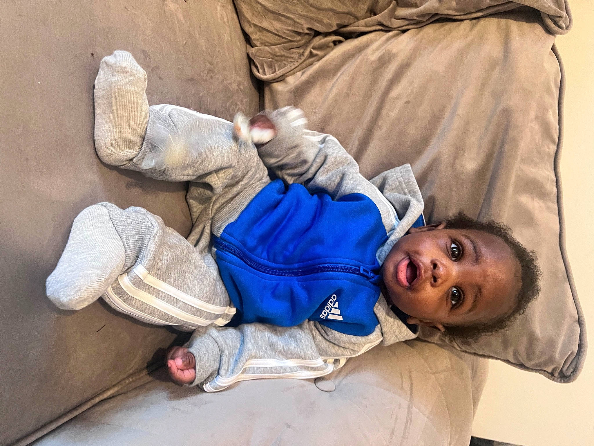 Cairo is registered to the contest to win money with this photo: baby, baby_sleeping, child, comfort, denim, elbow, gesture, human_leg, joint, leisure, linens, nap, outdoor_shoe, person, room, sitting, sleep, toddler, vacation, wood