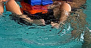 Aron is registered to the contest to win money with this photo: adult, care, child, child_in_water, closeup, floating, indoor_pool, leisure, life_vest, person, portrait, recreation, relaxing, safety, support, swimming_pool, swimsuit, water, water_sport, woman