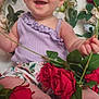 baby, child, smiling, flowers, roses, purple_top, floral_shorts, green_leaves, happy, sitting, cute, portrait, nature, plant, petals, skin, foot, hand, indoors, colorful