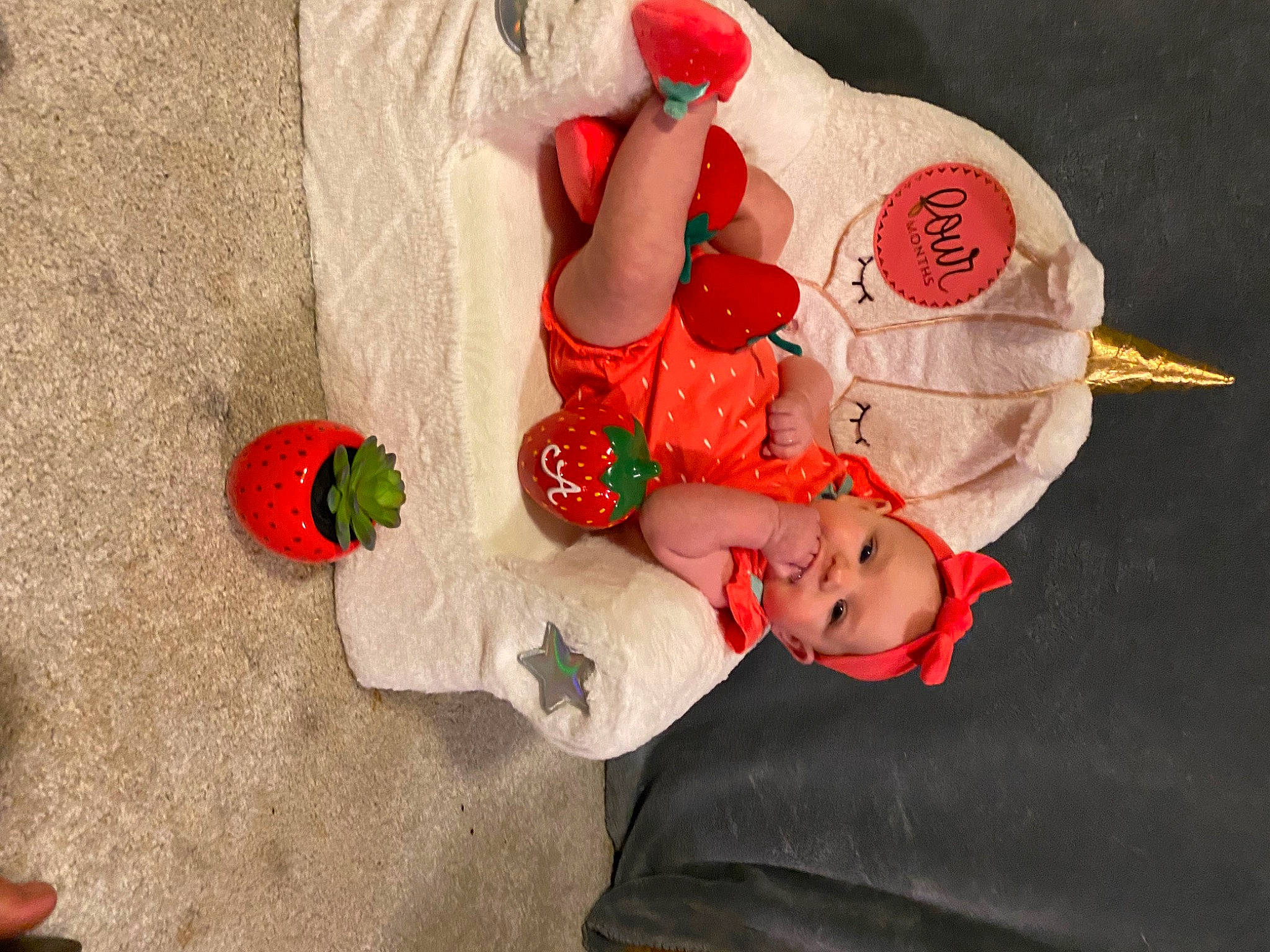 Astrid joined the competition — help win amazing prizes! baby, baby_products, baby_sleeping, baby_toddler_clothing, carmine, child, christmas, christmas_eve, comfort, event, fictional_character, hat, holiday, lap, orange, person, santa_claus, sleeve, sock, toddler