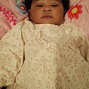 Amelia joined the competition — help win amazing prizes! adorable, baby, bedding, blanket, child, close_up, clothing, curly_hair, eyes, face, floral_pattern, infant, lying_down, mouth, nose, onesie, pink, portrait, sleepy, soft_light