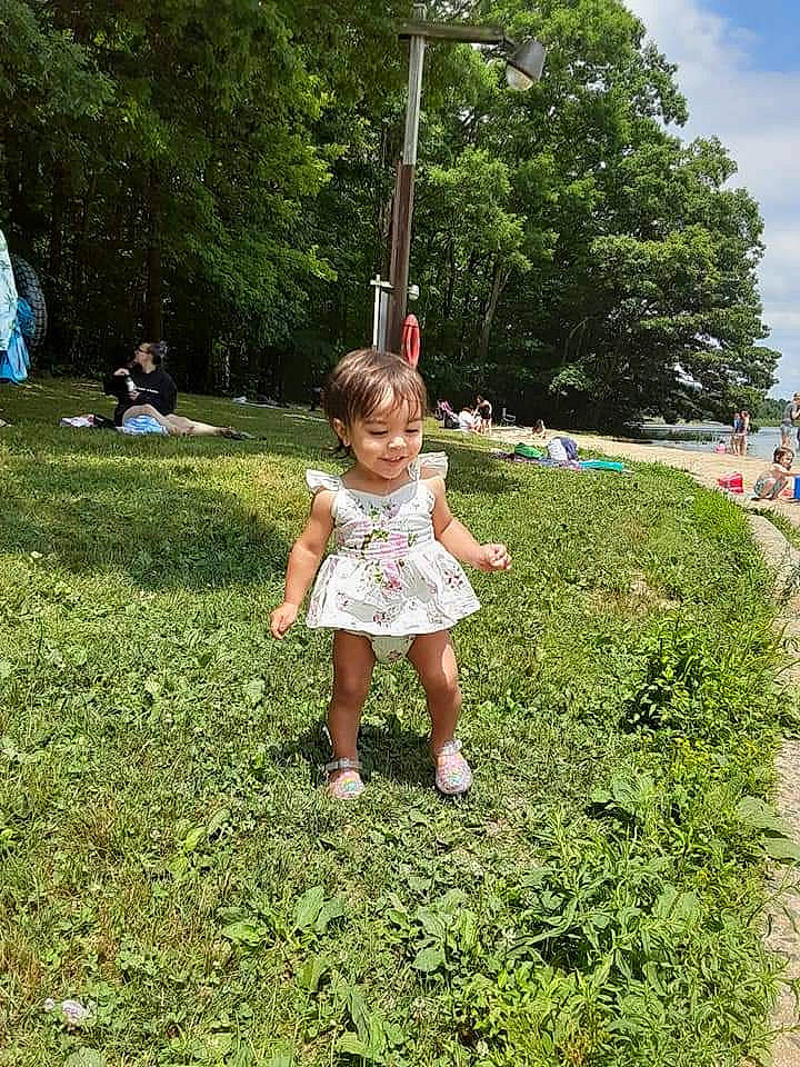 Kallie is registered to the contest to win money with this photo: botany, cloud, fun, grass, grass_family, grassland, groundcover, happy, joy, lawn, leaf, leisure, meadow, nature, people_in_nature, person, plant, recreation, sky, toddler
