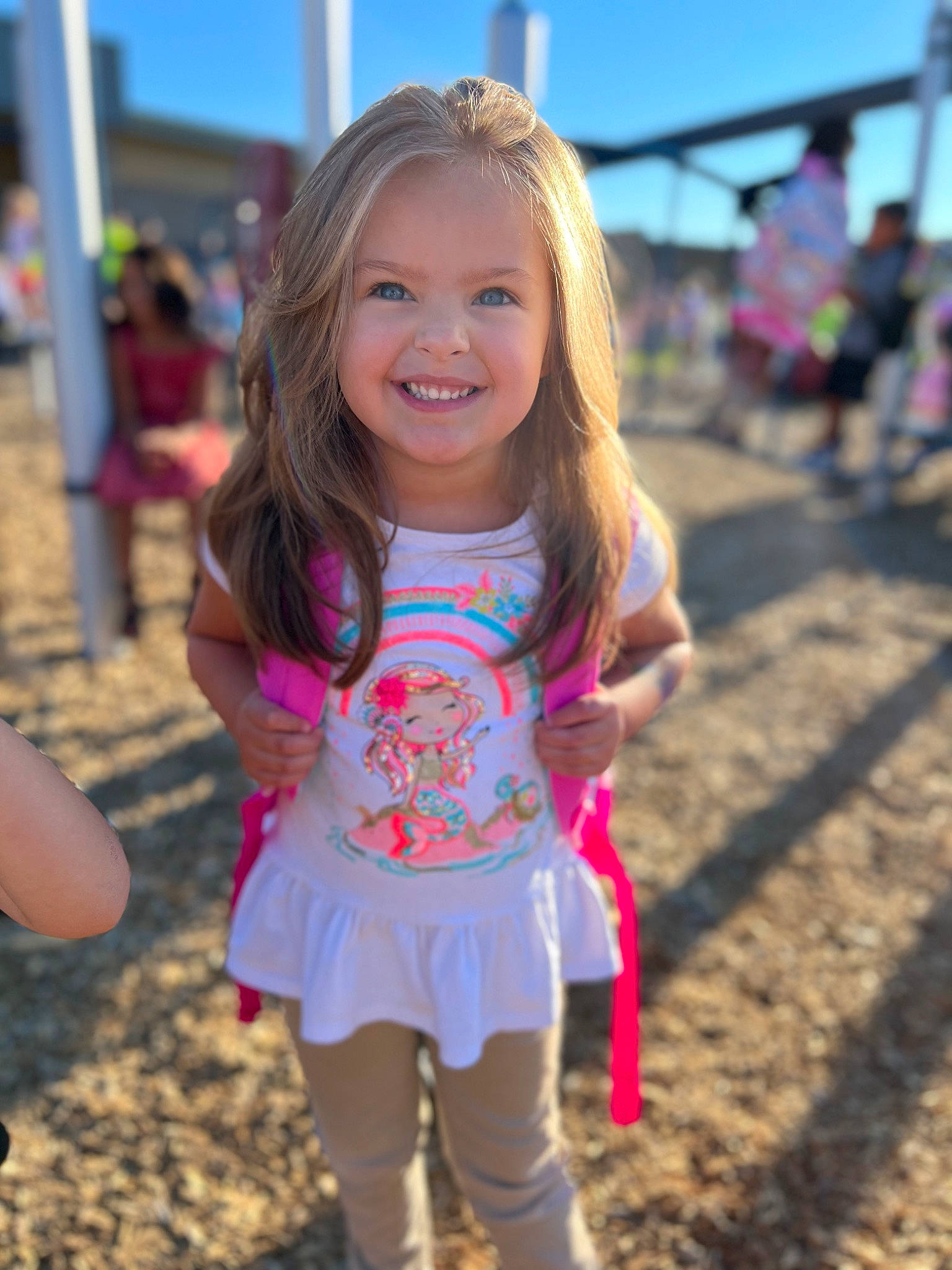 Emmalynn is registered to the contest to win money with this photo: body_of_water, face, facial_expression, fun, hair, hairstyle, happy, joy, leisure, magenta, people_in_nature, person, pink, recreation, sky, sleeve, smile, standing, travel, tree