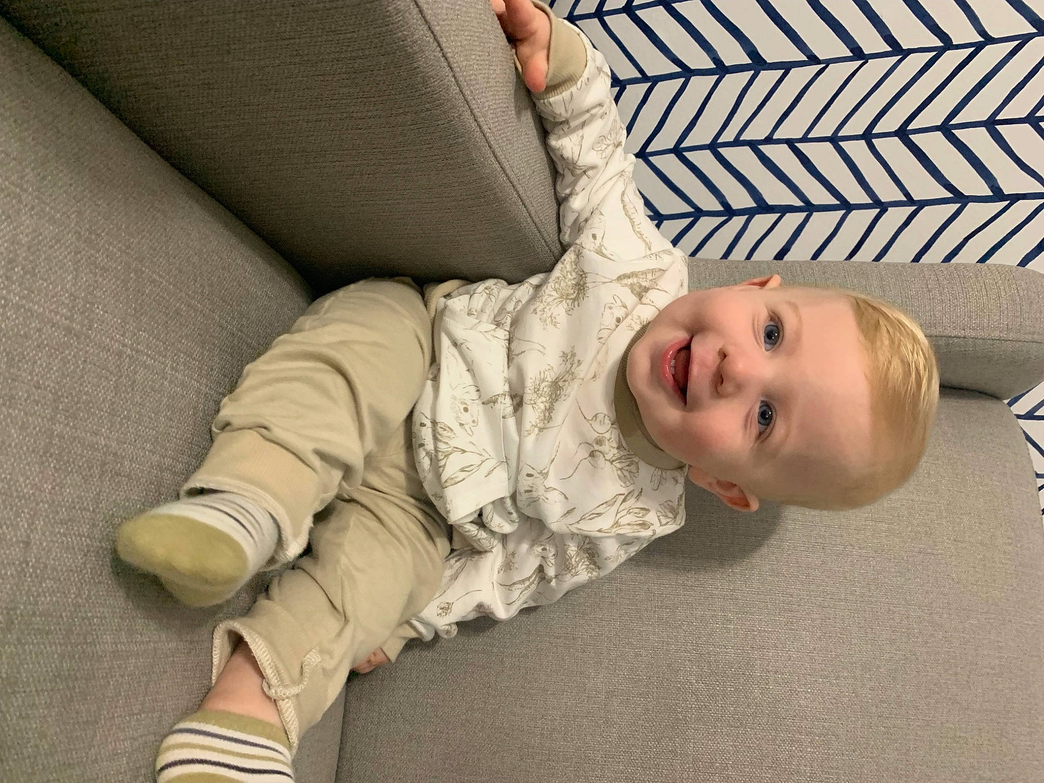 Hudson is registered to the contest to win money with this photo: baby, baby_laughing, baby_products, baby_safety, baby_toddler_clothing, cheek, child, comfort, eye, floor, flooring, happy, hardwood, joy, linens, nose, person, sitting, sleeve, smile