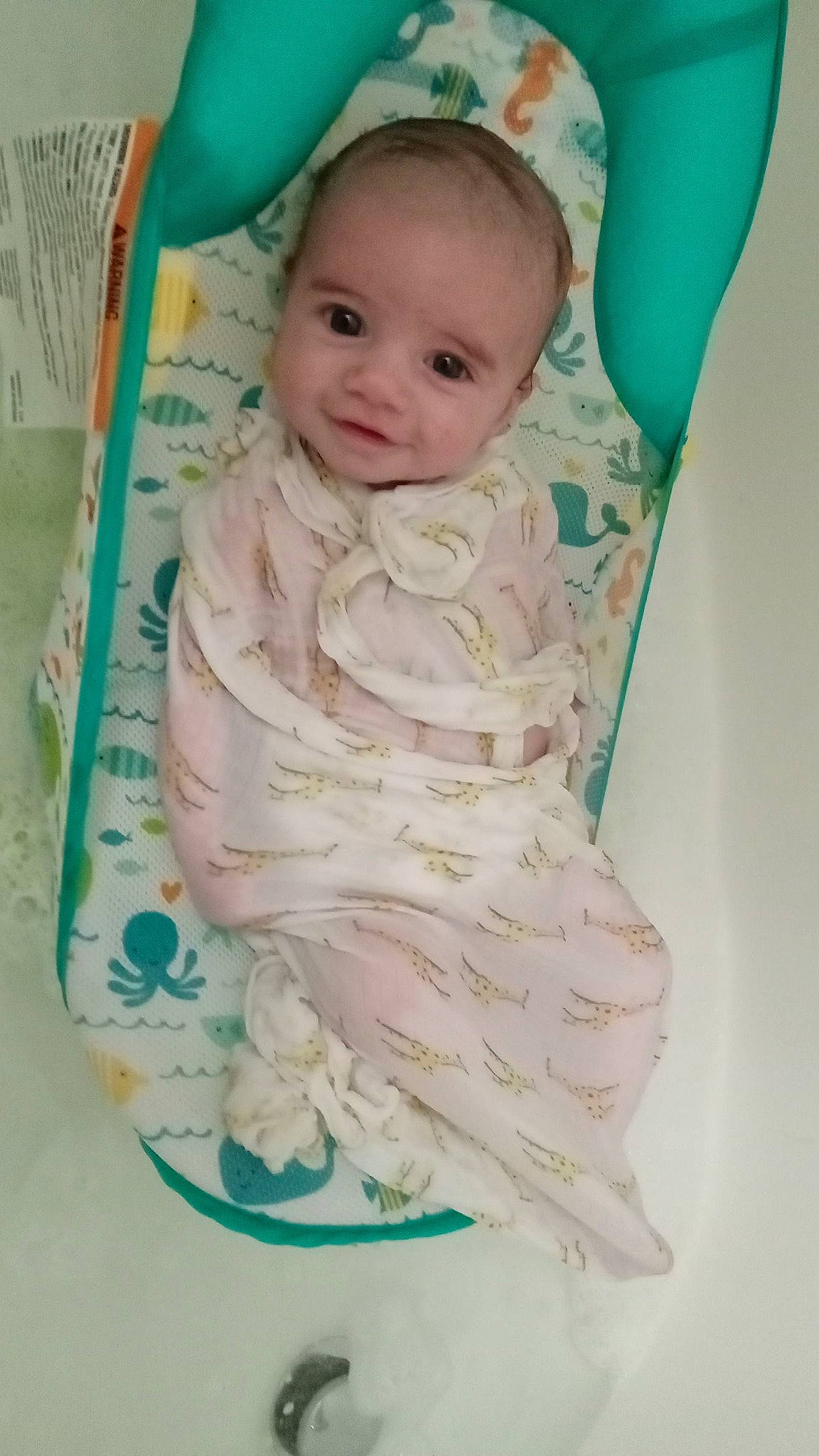 Kaius is registered to the contest to win money with this photo: baby, baby_products, baby_safety, baby_sleeping, baby_toddler_clothing, bedding, cheek, child, comfort, cradle, face, head, infant_bed, linens, pattern, person, sitting, skin, sleeve, smile