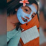 young_person, face_mask, pink_flower, selfie, wooden_background, handwritten_paper, long_hair, casual_clothing, earring, indoor, portrait, skin_care, face, study_material, filter, beauty, female, writing, paper, relaxation