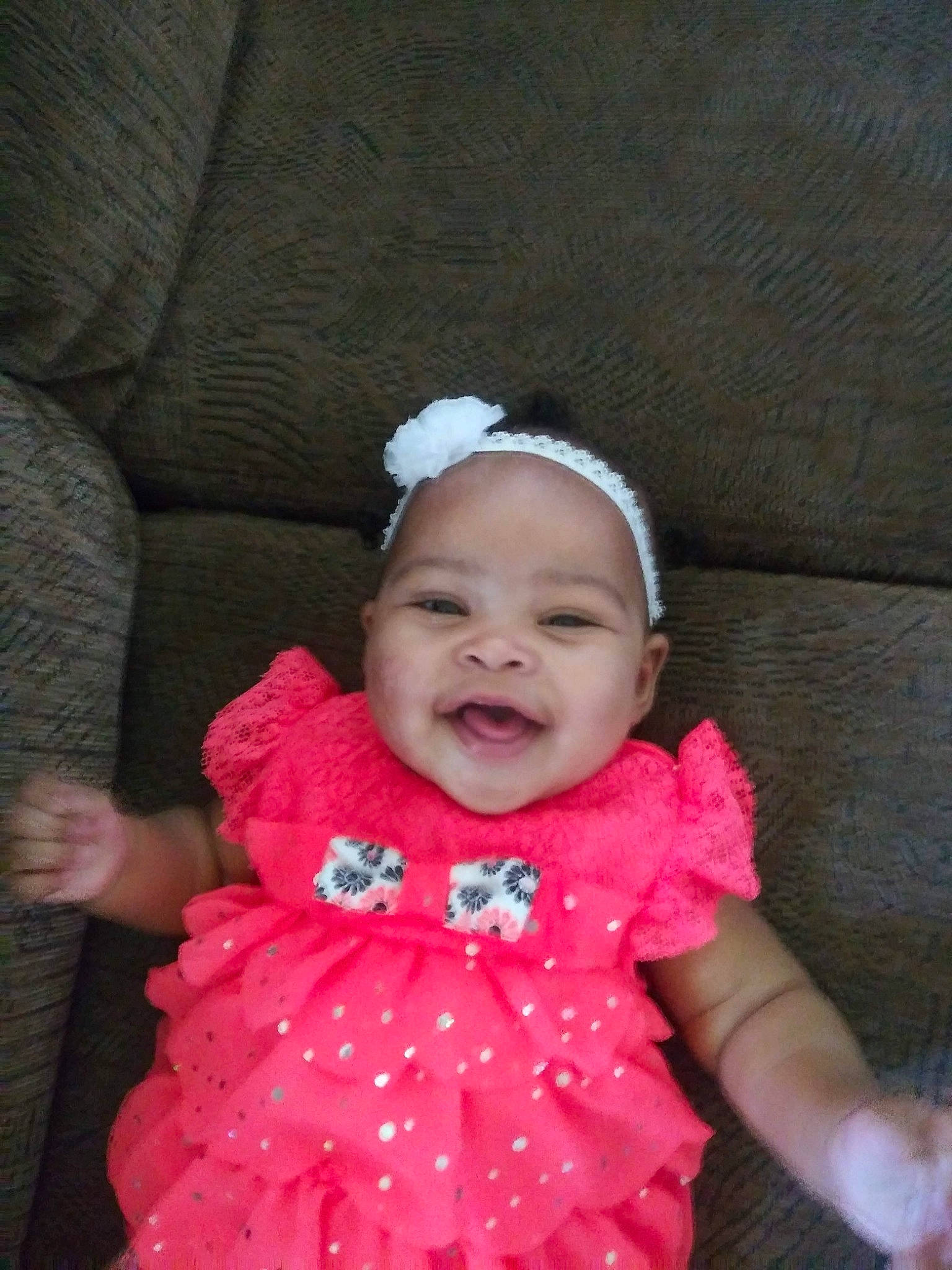 Dayanna is registered to the contest to win money with this photo: baby, cheek, child, dress, fun, hair_accessory, person, pink, skin, smile, toddler