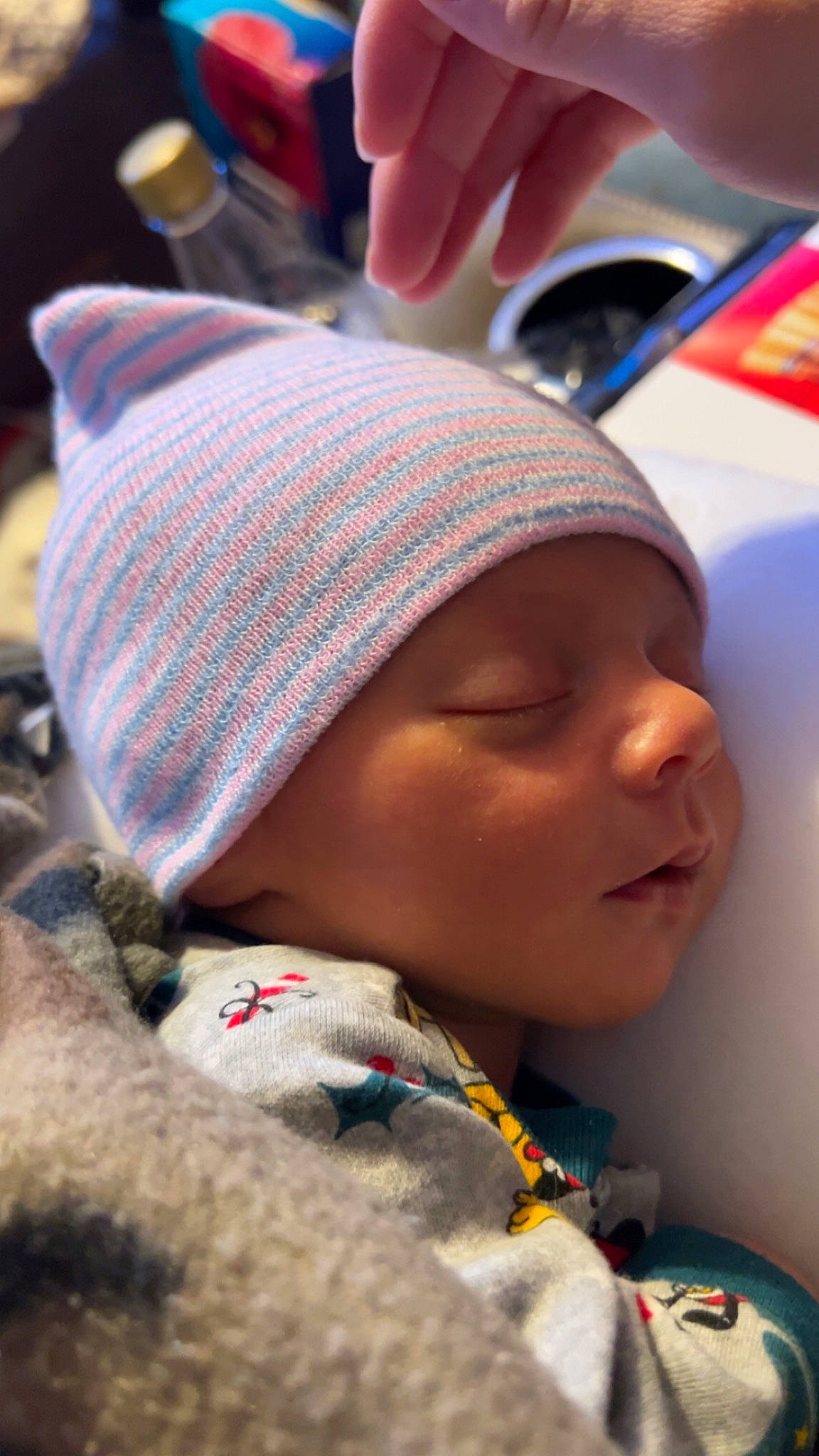 Garret is registered to the contest to win money with this photo: baby, baby_products, beanie, cap, cheek, child, chin, comfort, fun, happy, headgear, headwear, knit_cap, lip, mouth, nap, nose, person, skin, textile