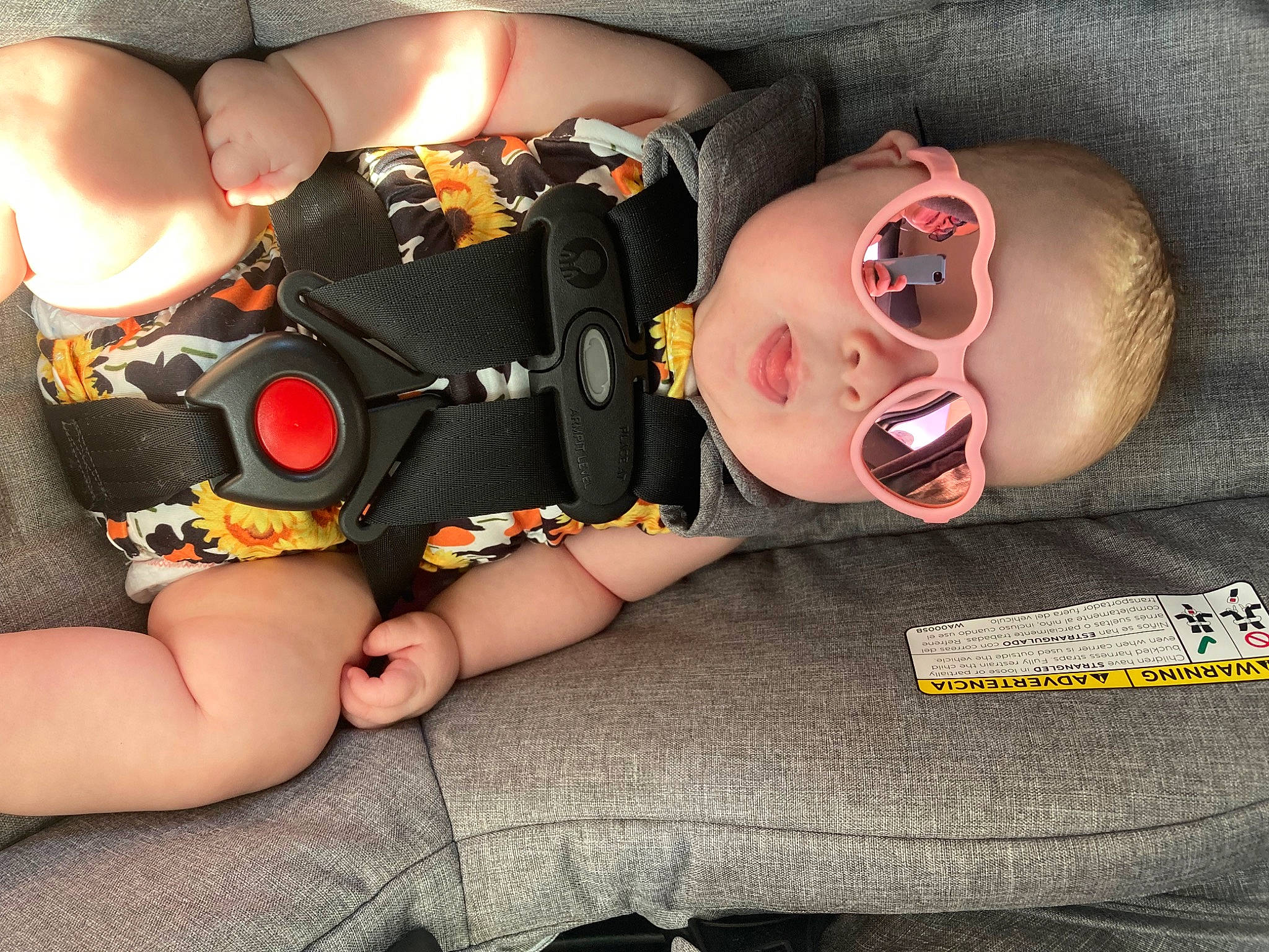 Lennix is registered to the contest to win money with this photo: baby, baby_toddler_clothing, child, comfort, eye, eyewear, finger, head, headgear, human_body, human_leg, knee, mouth, nail, neck, person, personal_protective_equipment, thigh, thumb, toy