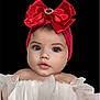 baby, child, portrait, headband, red_bow, dress, white_dress, face, cute, adorable, young_child, infant, fashion, studio, black_background, eyes, eyelashes, lips, skin, person