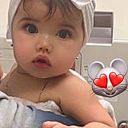 Sofia is registered to the contest to win money with this photo: adorable, arm, baby, bow, bracelet, child, curious, cute, expression, face, hand, headband, holding, indoor, jewelry, large_eyes, love, mouse_emoji, person, white