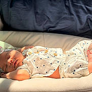 Cataleya joined the competition — help win amazing prizes! baby, sleeping, infant, polka_dot, headband, cushion, blanket, soft_fabric, clothing, foot, hand, face, indoors, sunlight, peaceful, cute, newborn, resting, portrait, comfort