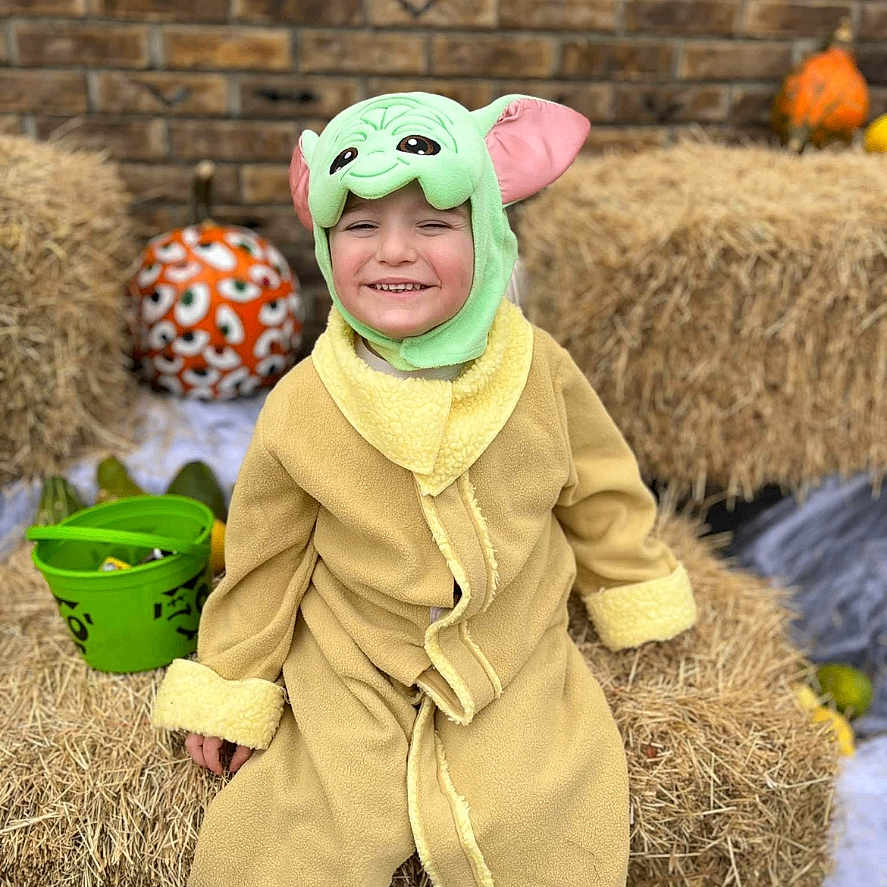 Jamie joined the competition — help win amazing prizes! baby, bonnet, cap, clothing, coat, costume, countryside, face, glove, hat, head, hood, jacket, nature, outdoors, person, photography, portrait, soil, straw