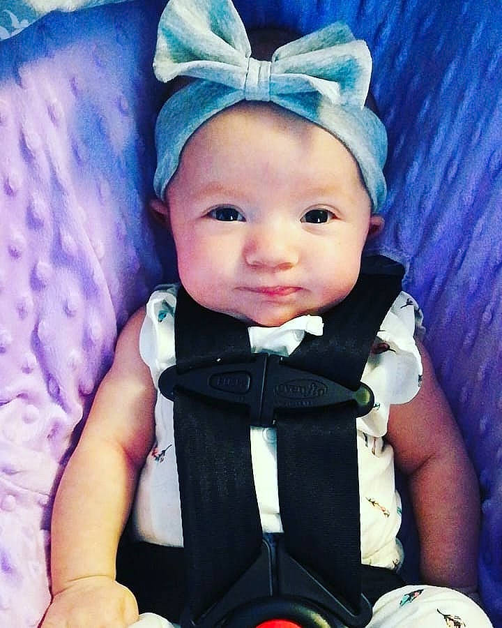 Ember is registered to the contest to win money with this photo: baby, baby_in_car_seat, baby_products, baby_toddler_clothing, bow_tie, cheek, child, cool, ear, eye, head, headgear, person, product, sitting, smile, tie, toddler