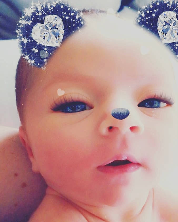 Ember is registered to the contest to win money with this photo: baby, beauty, cheek, child, crown, eye, eyebrow, face, fashion_accessory, forehead, hair_accessory, head, headband, headgear, headpiece, lip, nose, person, pink, skin