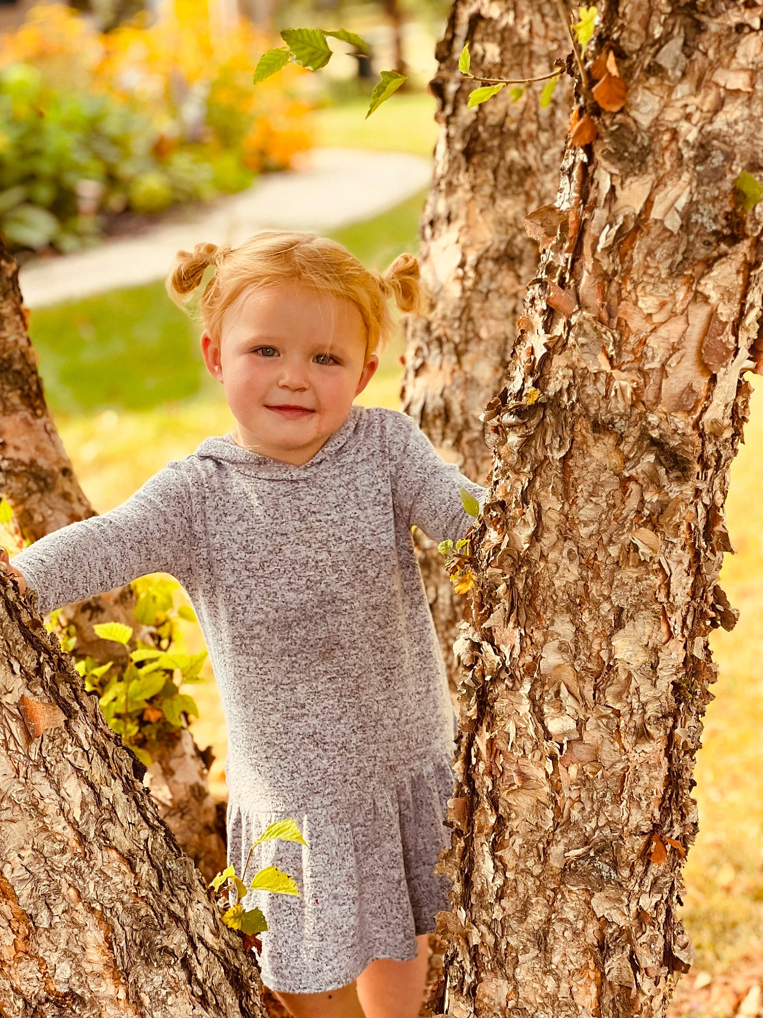 Payton Lee joined the competition — help win amazing prizes! child, deciduous, face, forest, fun, gesture, grass, happy, joy, people_in_nature, person, plant, sleeve, smile, t_shirt, toddler, tree, trunk, twig, wood