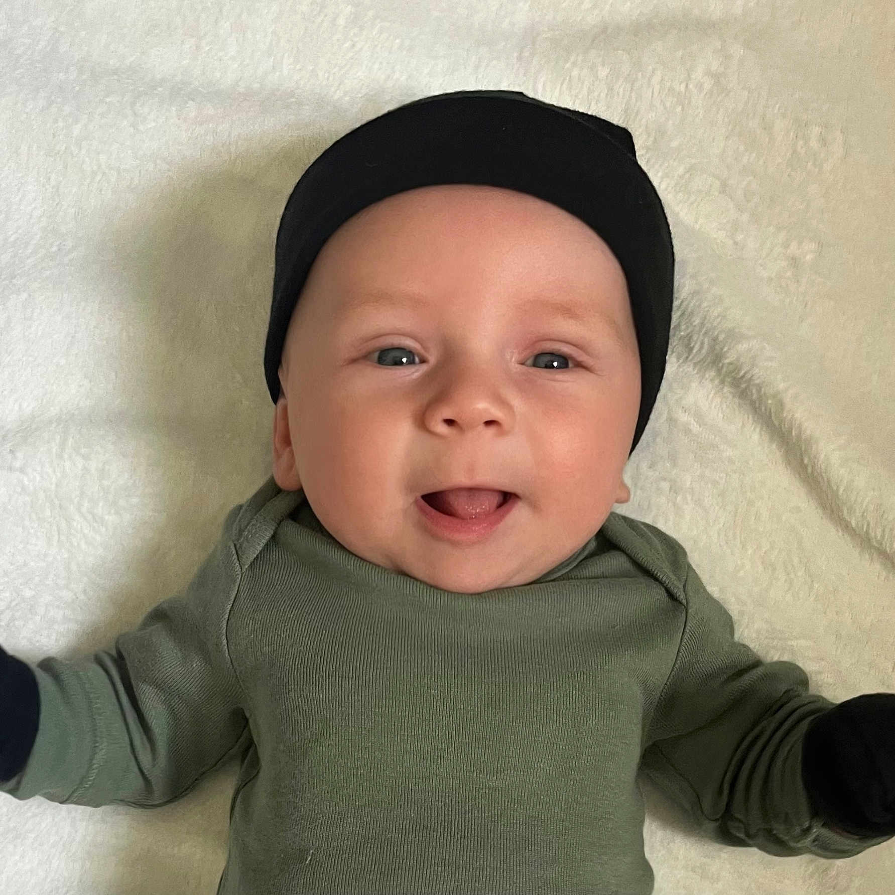Asher joined the competition — help win amazing prizes! baby, babylaughing, cap, clothing, face, glove, happy, hat, head, person, photography, portrait, smile