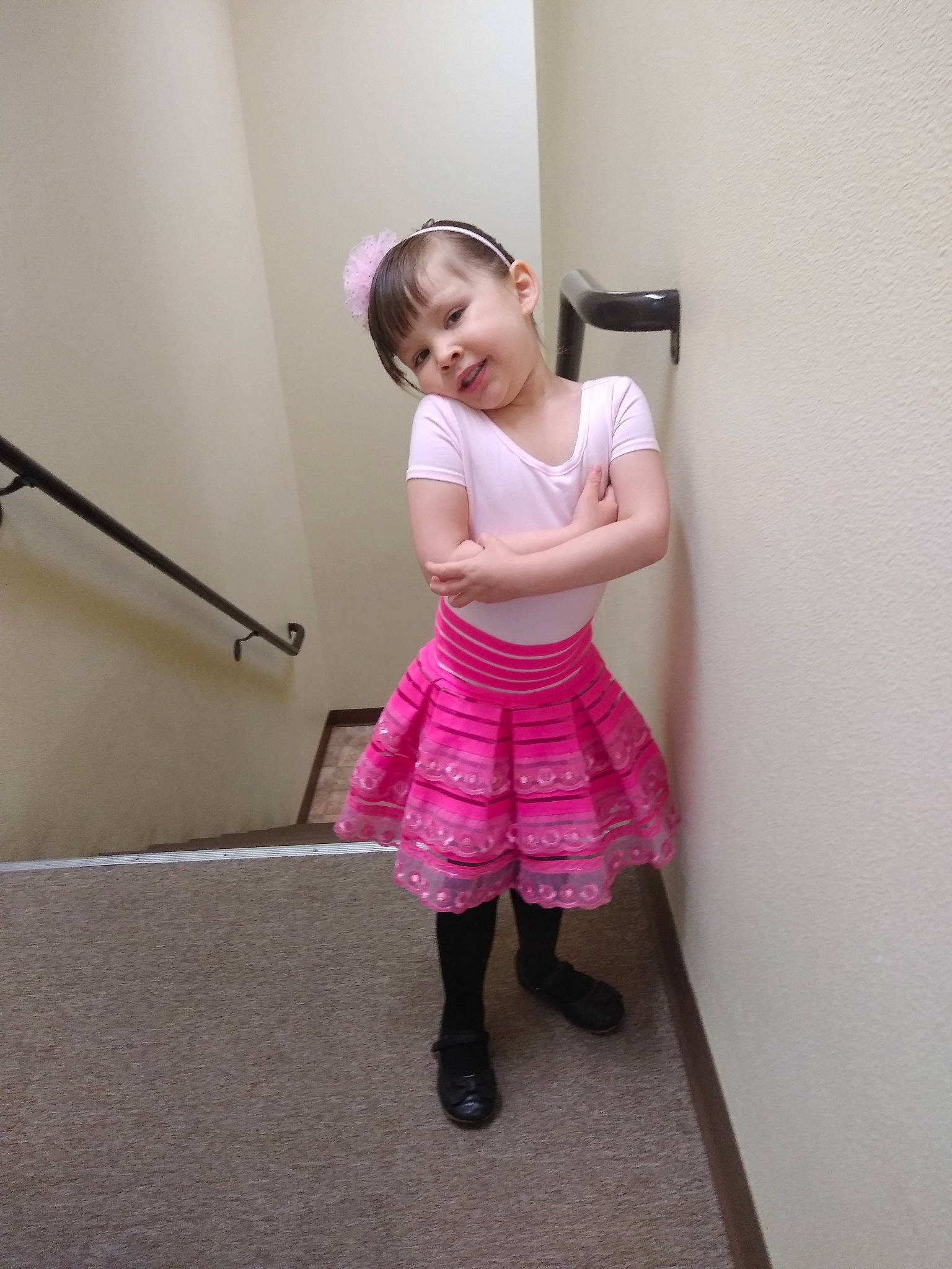 Kayani is registered to the contest to win money with this photo: arm, child, costume, dress, human_body, joint, knee, leg, person, pink, shoe, shoulder, smile, standing, toddler