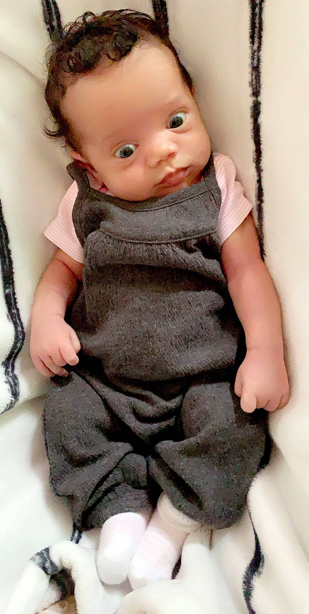 Laylah is registered to the contest to win money with this photo: baby, baby_toddler_clothing, cheek, child, doll, eyelash, finger, head, human_body, joint, lip, neck, pattern, person, pink, skin, sleeve, toy, trunk, waist